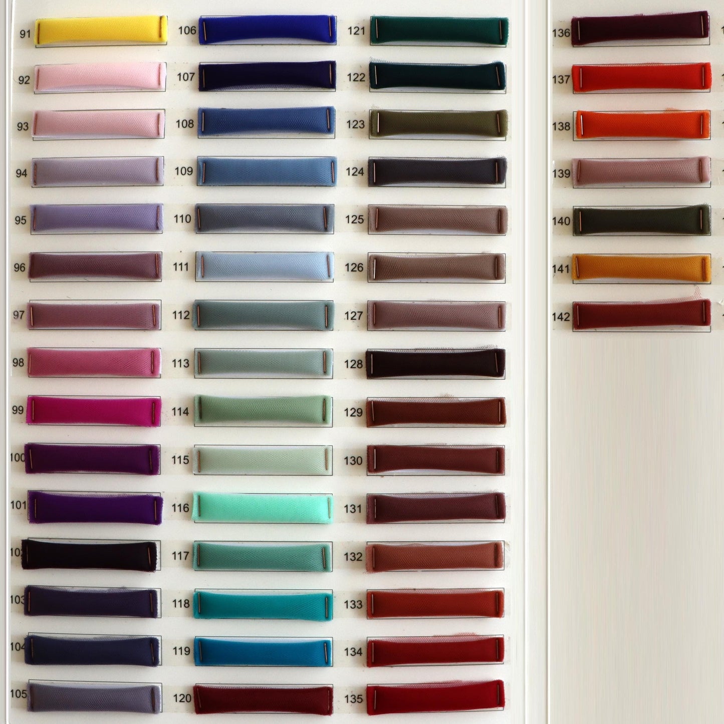 a wall with a bunch of different colors on it