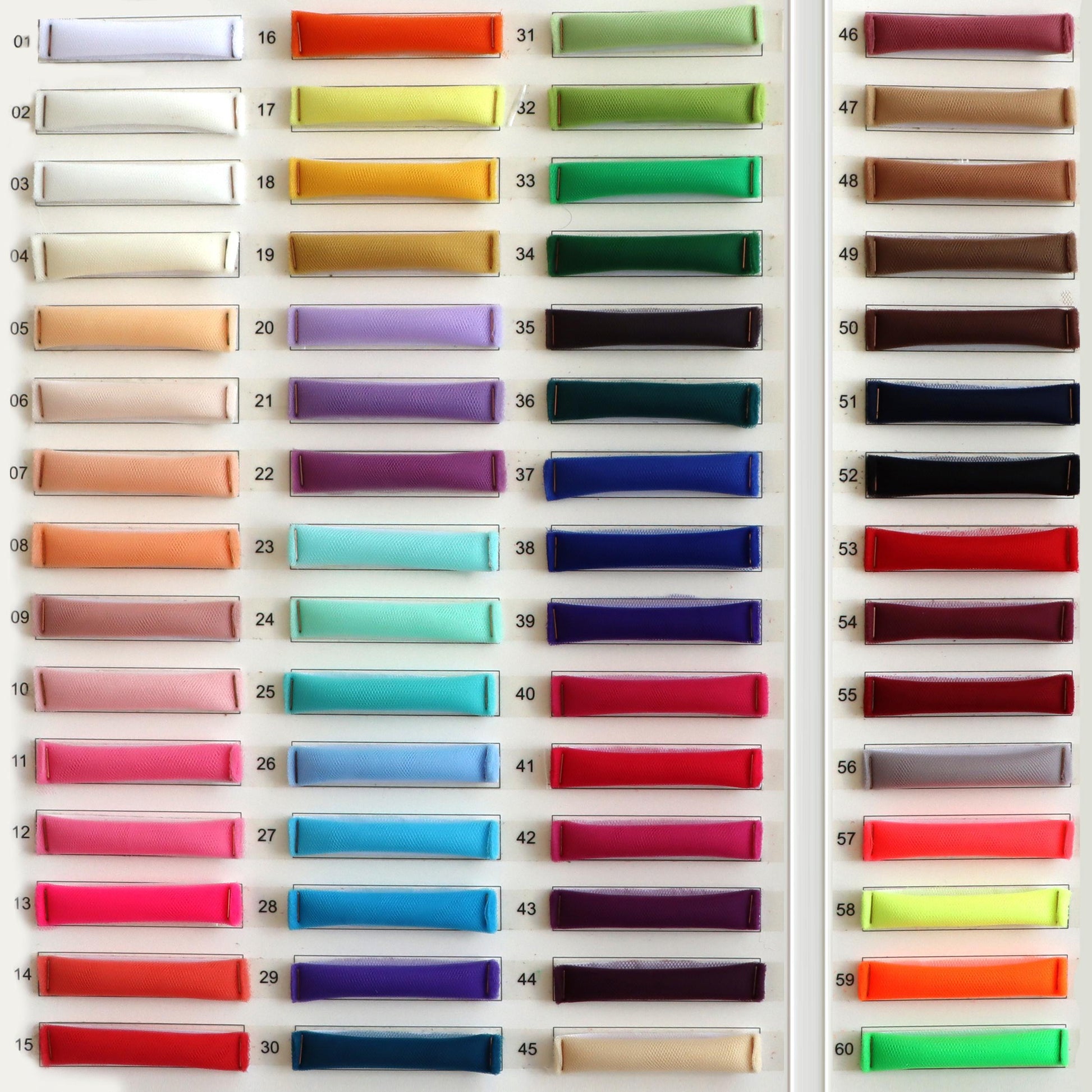 a large display of different colors of paper