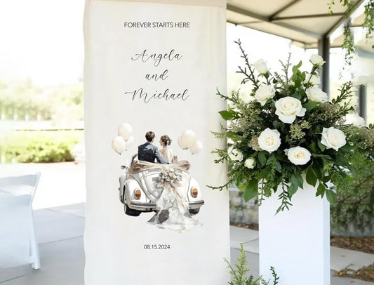 a wedding invitation with a couple riding in a vintage car, surrounded by a floral arrangement.