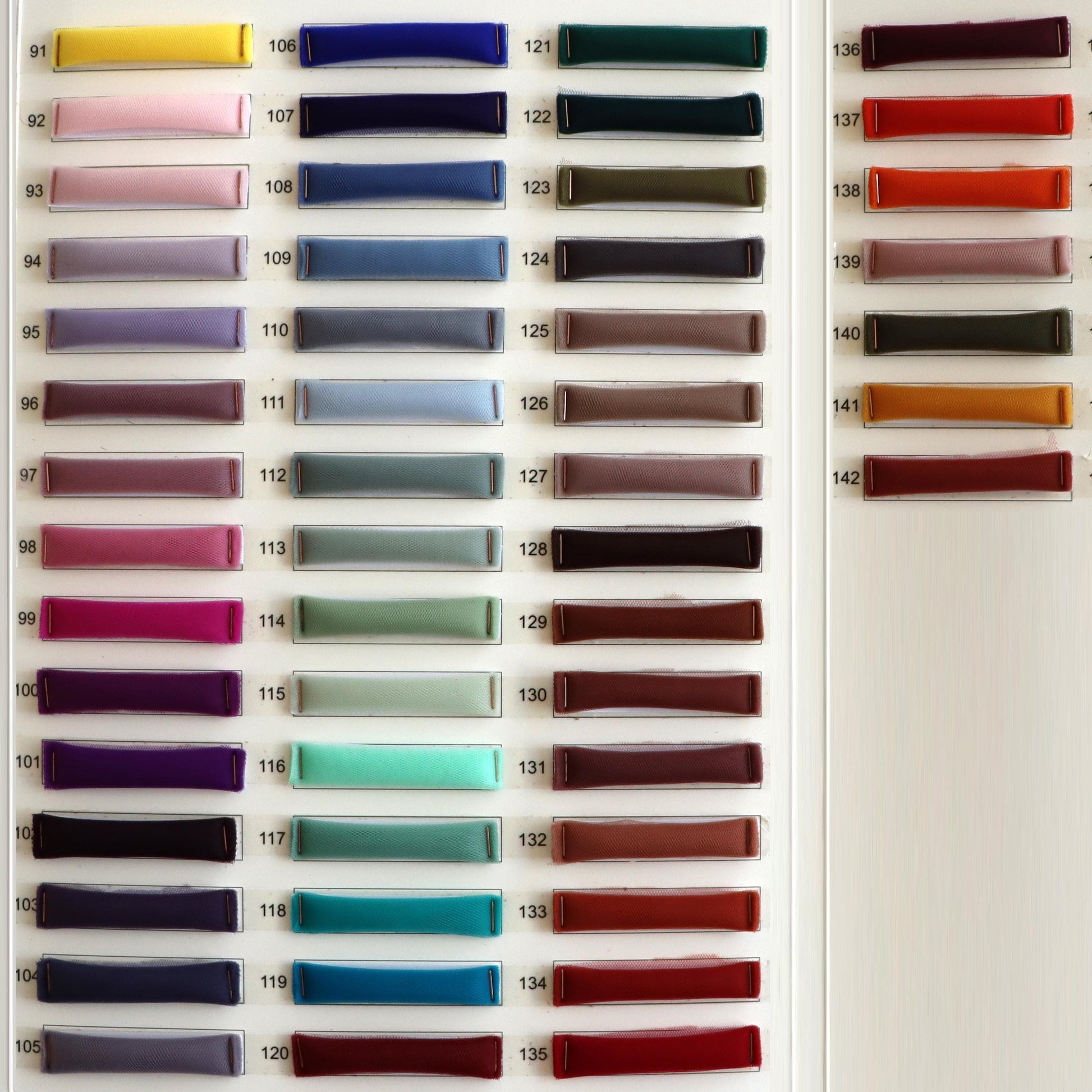 a wall with a bunch of different colors on it