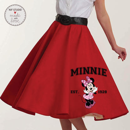 A red, full-skirted dress with a Minnie Mouse design and the text &quot;MINNIE EST. 1928&quot; printed on it.