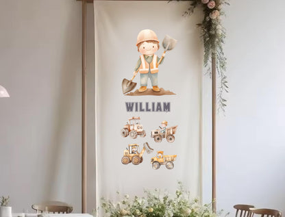 A banner featuring a cartoon construction worker, with the name &quot;WILLIAM&quot; displayed below the image.