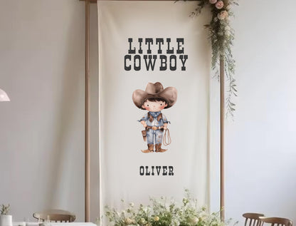 a banner with a cartoon cowboy character and the text &quot;Little Cowboy Oliver&quot; on it.