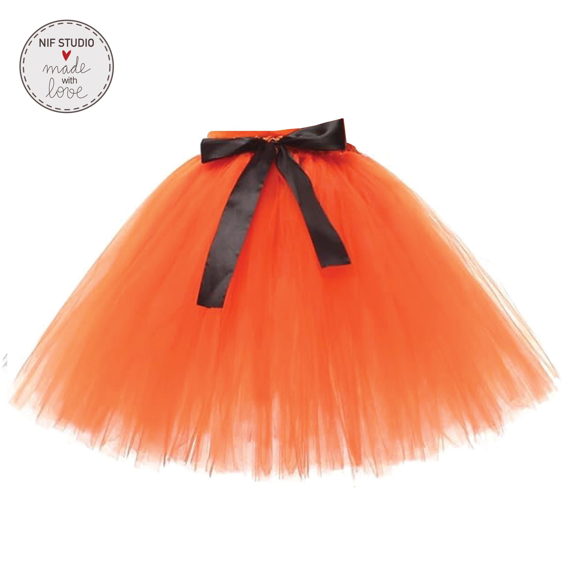 A bright orange tulle skirt with a black bow tied at the waist.