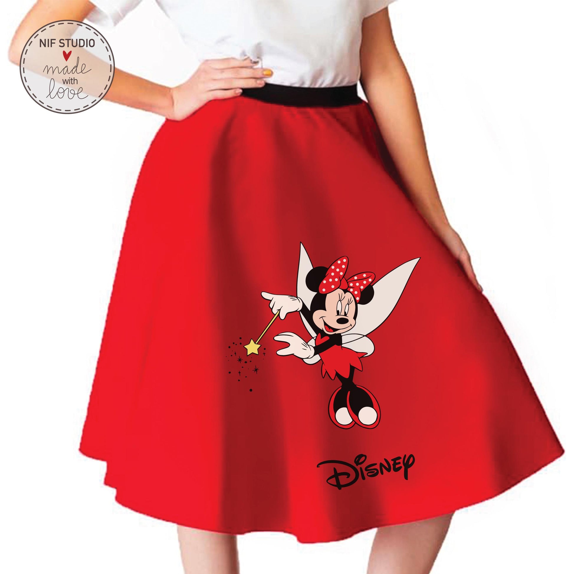 A woman wearing a red skirt with a Minnie Mouse design on it.