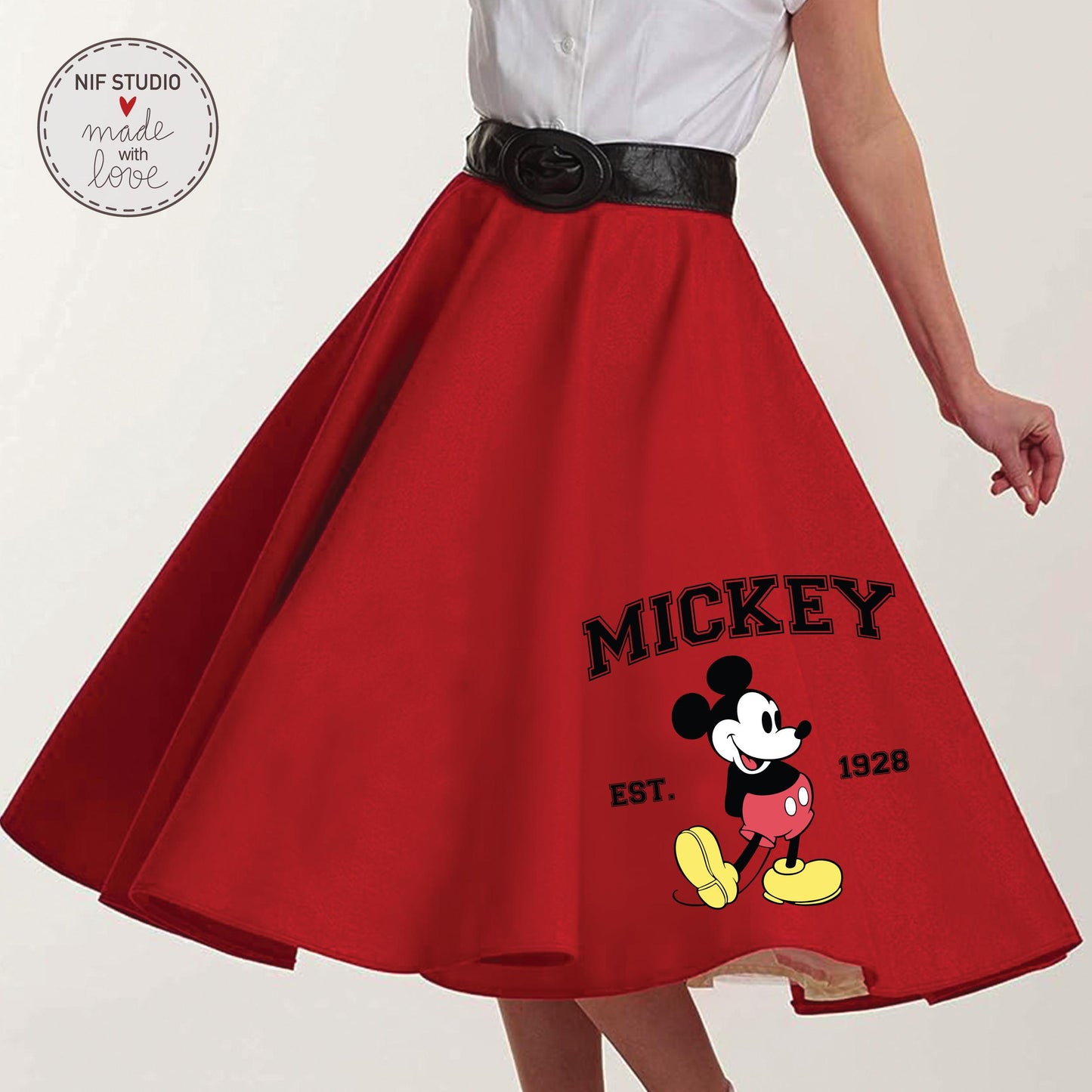 A red, full-skirted dress with a Mickey Mouse design and the text &quot;MICKEY EST. 1928&quot; printed on it.
