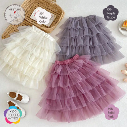 a picture of a dress and shoes on a table