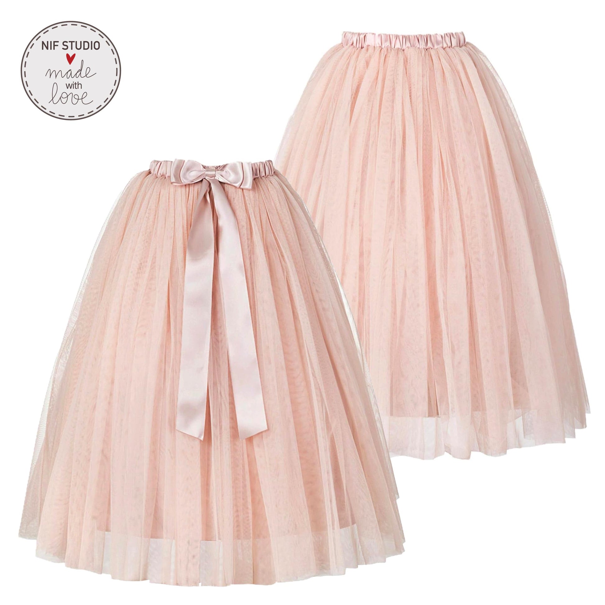 two pink tulle skirts with bows, one on top of the other, against a white background.