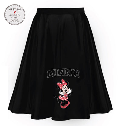 A black skirt with a Minnie Mouse printed on it.