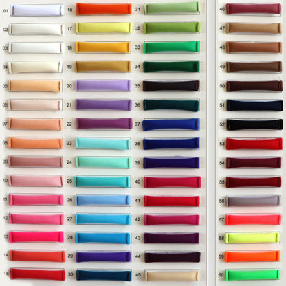 a large display of different colors of paper