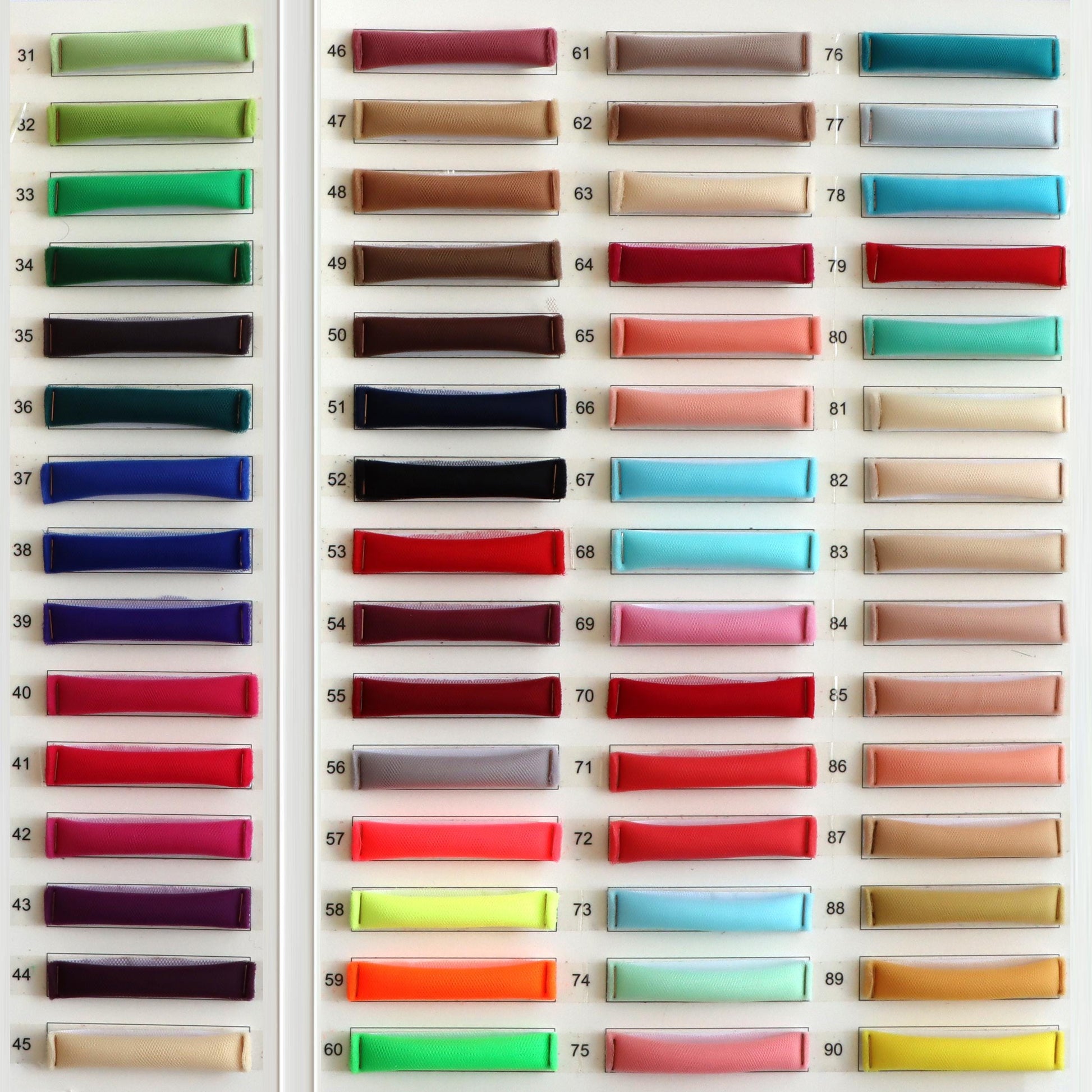 a large display of different colors of satin ribbons