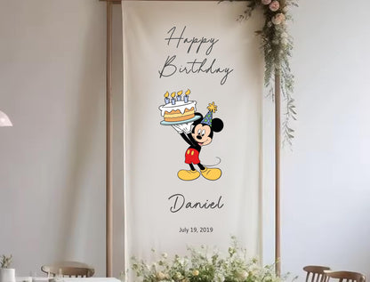 A banner with a cartoon character holding a birthday cake, celebrating Daniel&#39;s birthday.